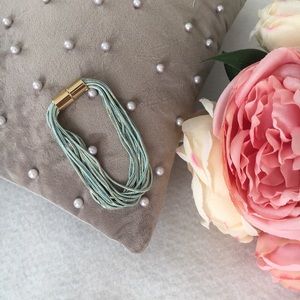 MULTISTRAND BRACELET WITH MAGNETIC CLASP